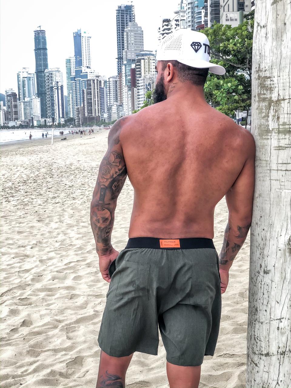 camisa social masculina com manga dobrada